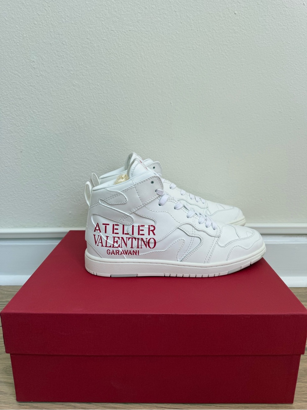 Valentino Garavani White High-Top Sneakers with Red Logo